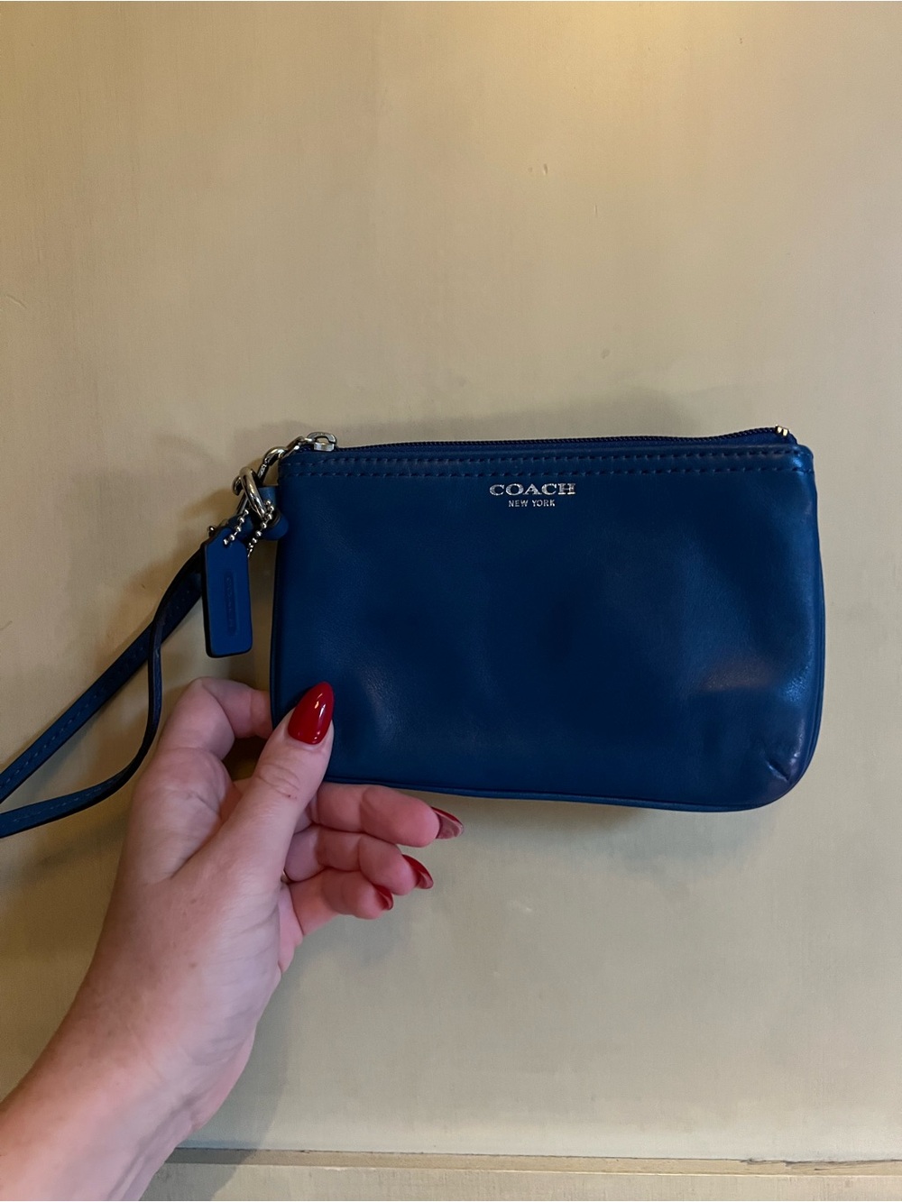 blue coach wristlet